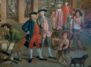 A section of a painting depicting 18th century life. In the image, two men in colonial clothing are seen in the foreground standing near a young man and dog. . 