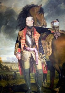 A portrait of John Manners, Marquess of Granby (1721-1770) standing next to a horse and looking to his right. He appears to be dressed in battle attire. 