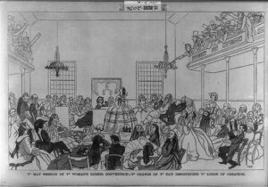 An illustration depicting a scene from a Woman's Rights Convention. The scene depicts a crowded room with many people facing the center of the room where one woman is speaking.