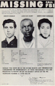 Missing persons poster created by the FBI in 1964, signed by the Director J. Edgar Hoover. Shows the photographs of Andrew Goodman, James Chaney, and Michael Schwerner.