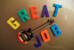 Refrigerator magnets saying "Great Job"