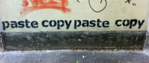 Graffiti that says Paste Copy Paste Copy