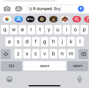 Screenshot of a smartphone keyboard in a text app. The user has typed U R Dumped. Sry.