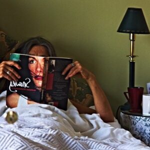 Person reading in bed