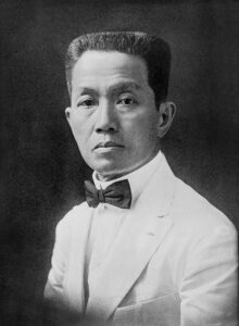 Emilio Aguinaldo portrait, wearing a white suit and bow tie.