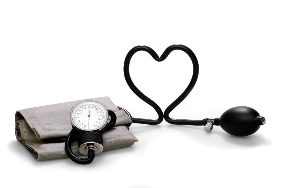 A blood pressure cuff with a tube in the shape of a heart.