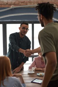 two men shaking hands