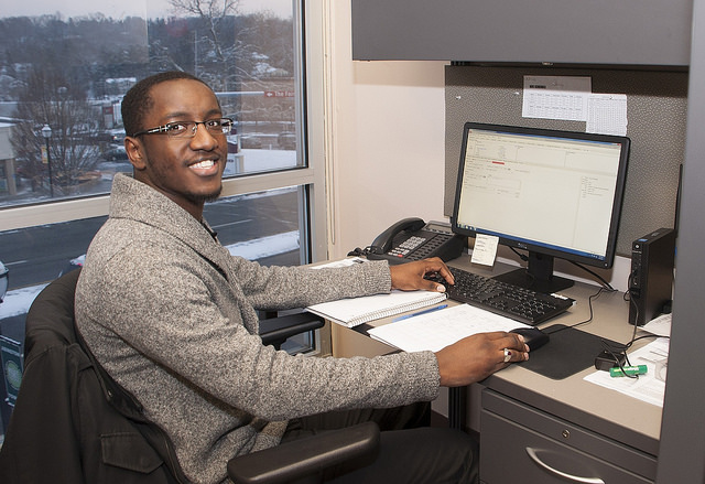 Young man sitting at a computer