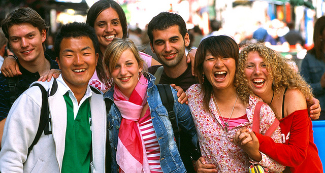 Photo of a diverse group of college-aged students.