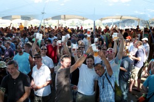 Timothy Horn Crowd glasses raised