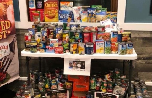 Table filled with canned or non-perishable foods
