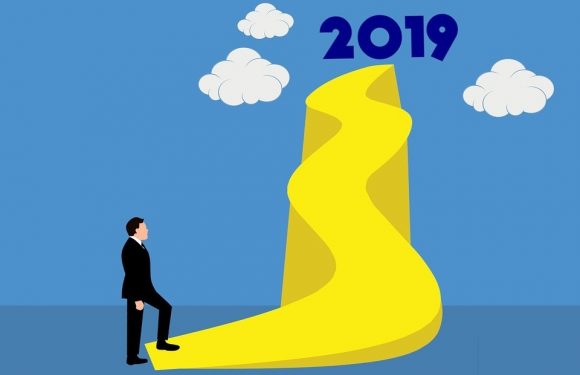 Long uphill sidewalk with 2019 at the top