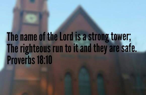 Old church with Bible verse over it