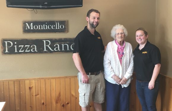 Monticello managers with a longtime guest