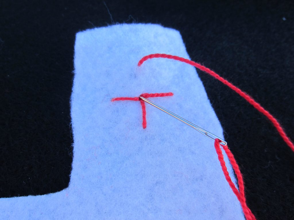Making a star stitch on the ornament