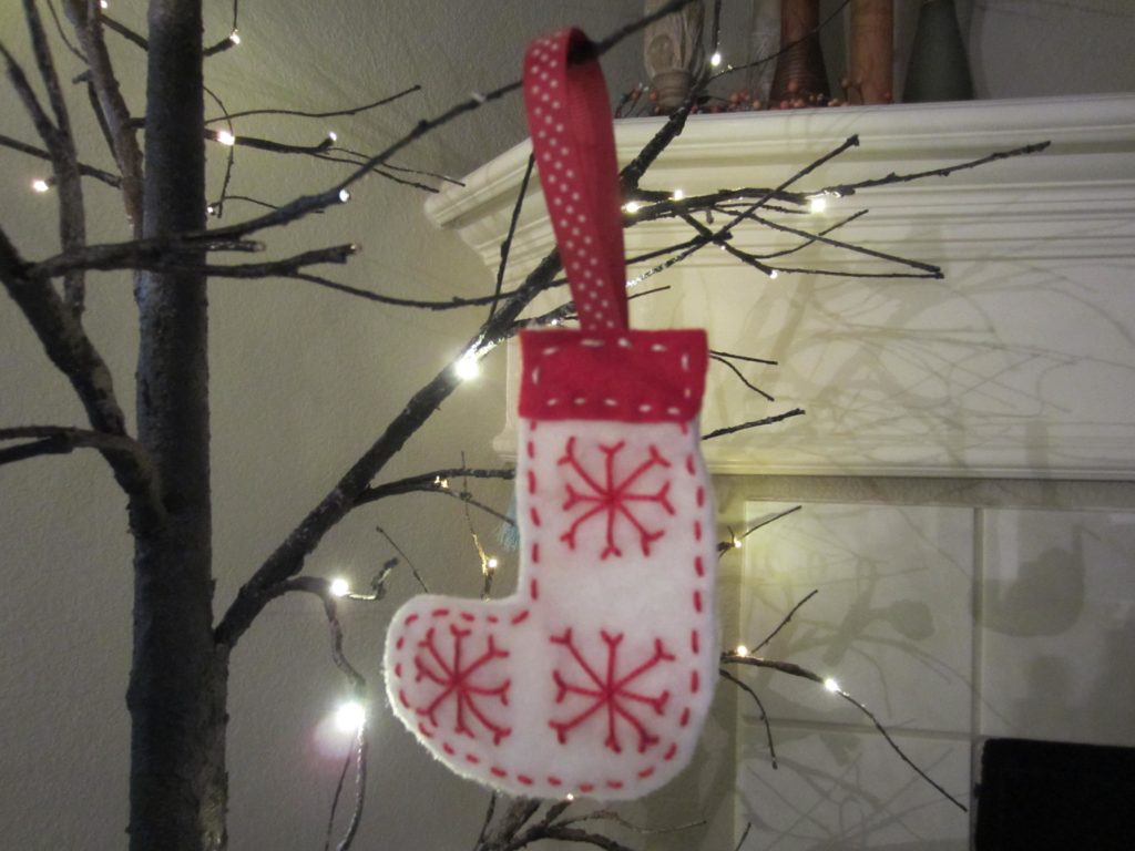Finished stocking retro ornaments with embroidered snowflakes
