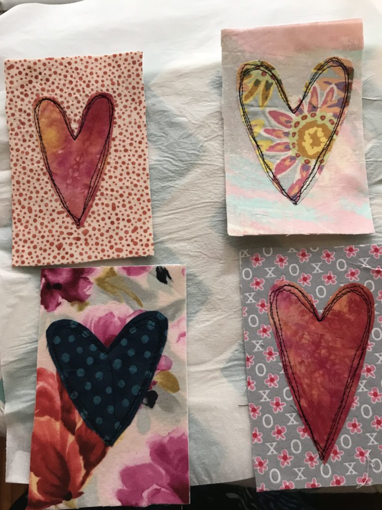 Hearts are sewn to the backgrounds