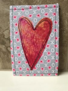 Big red heart on a lavender background