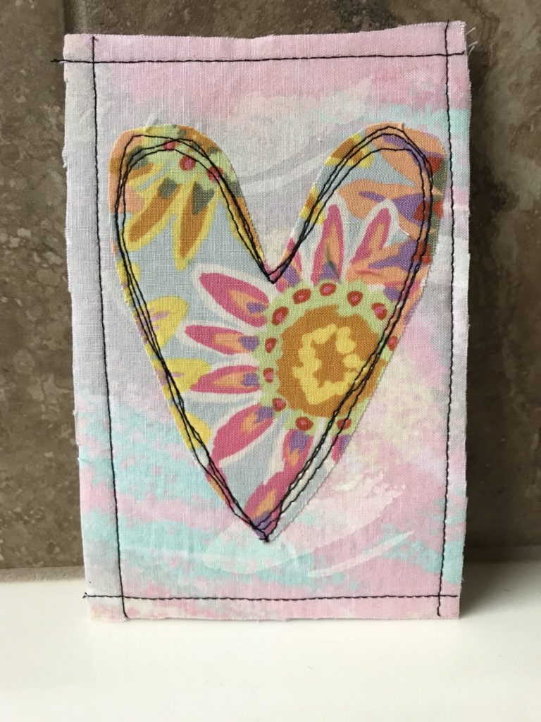 Add some stitching around the edges to border the card