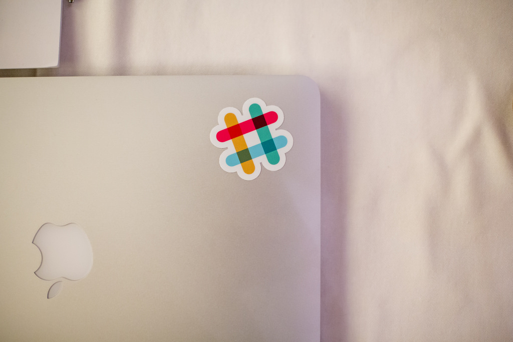 Slack, its logo seen above, is used by 18F for a number of internal purposes. (Kris Krug/Flickr)