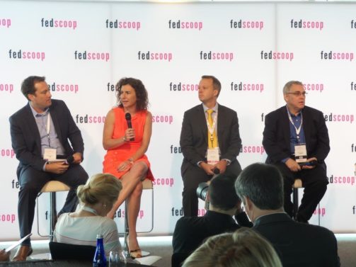Bob Nicholson, from Dell Federal, moderates a cyber panel with Kiersten Todt, Thomas McDermott and Bob Gourley. (Source: Fedscoop)