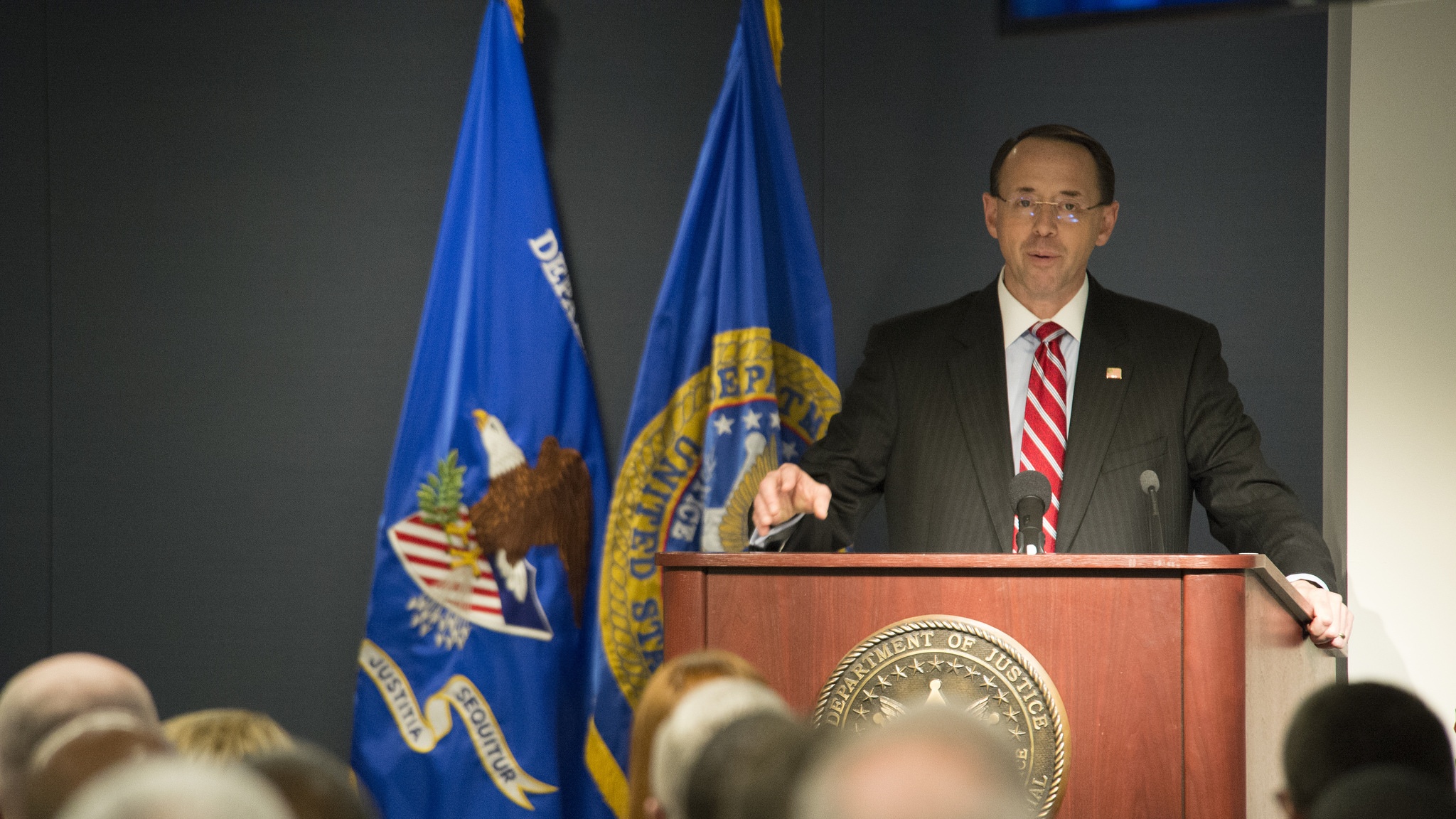 Justice Department charges 12 Russian intel officers in hack of DNC