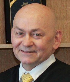 Ronald E. Albers                                                                                                                                                                                                                                               