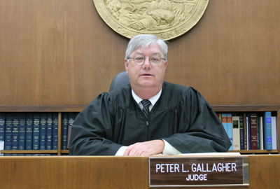 Peter L. Gallagher                                                                                                                                                                                                                                             