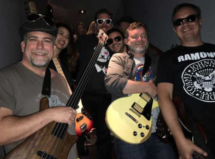 Greenberg Traurig LLP’s lawyers raise money with rock 