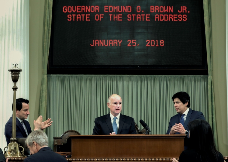 Governor defends gas tax hike, environmental policy in annual speech