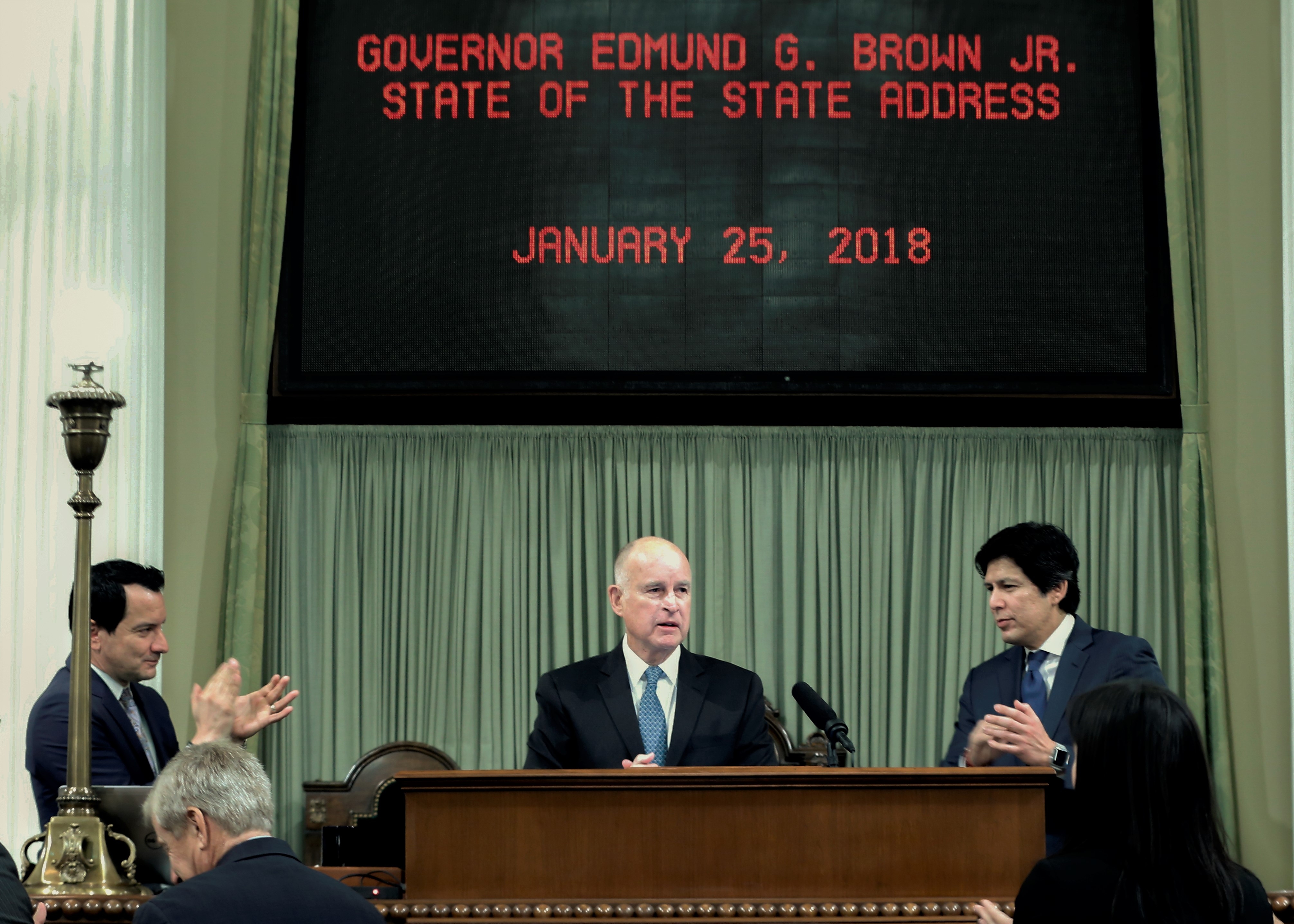 Governor defends gas tax hike, environmental policy in annual speech