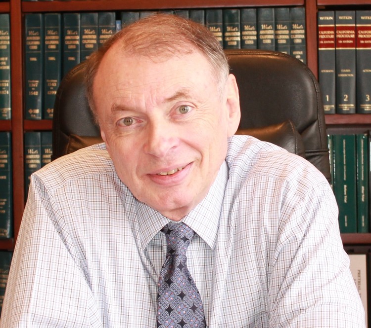 Defendant-attorney in fraud trial blames office manager 