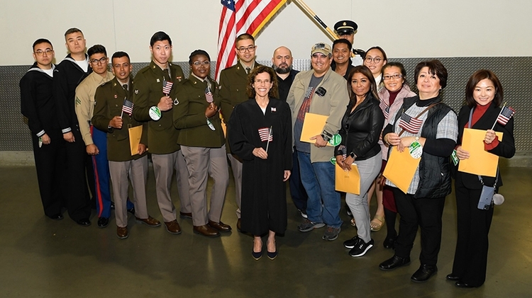 Judge administers Oath of Allegiance to new Americans at SoFi Stadium