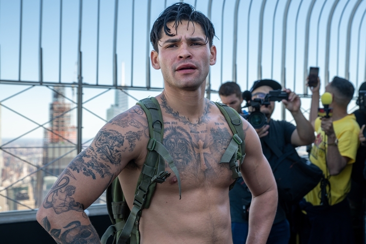Fight promoter Fanmio says boxer feigned injury, seeks millions 