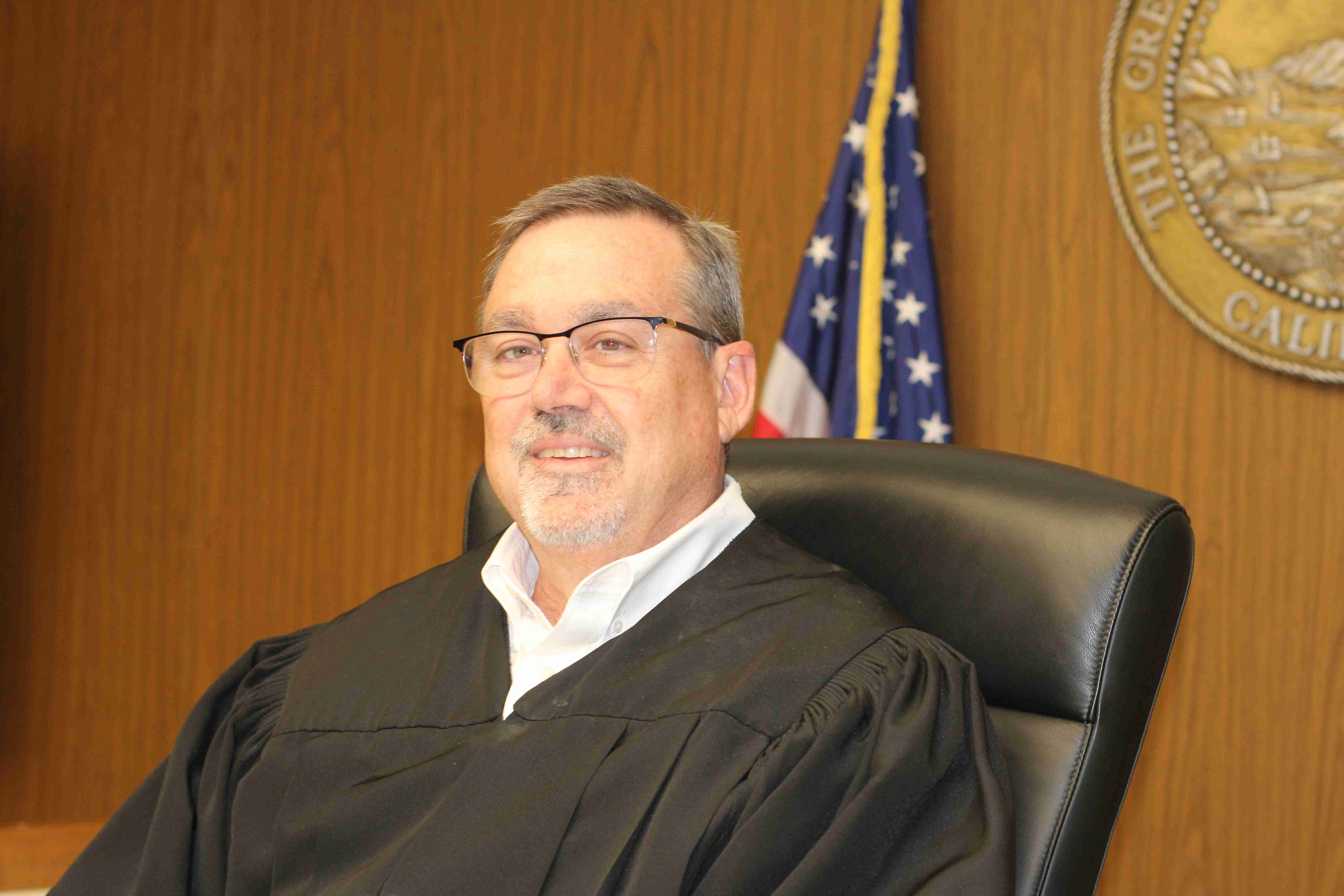 Judge Michael O'Gara balances efficiency with empathy in debt collection court