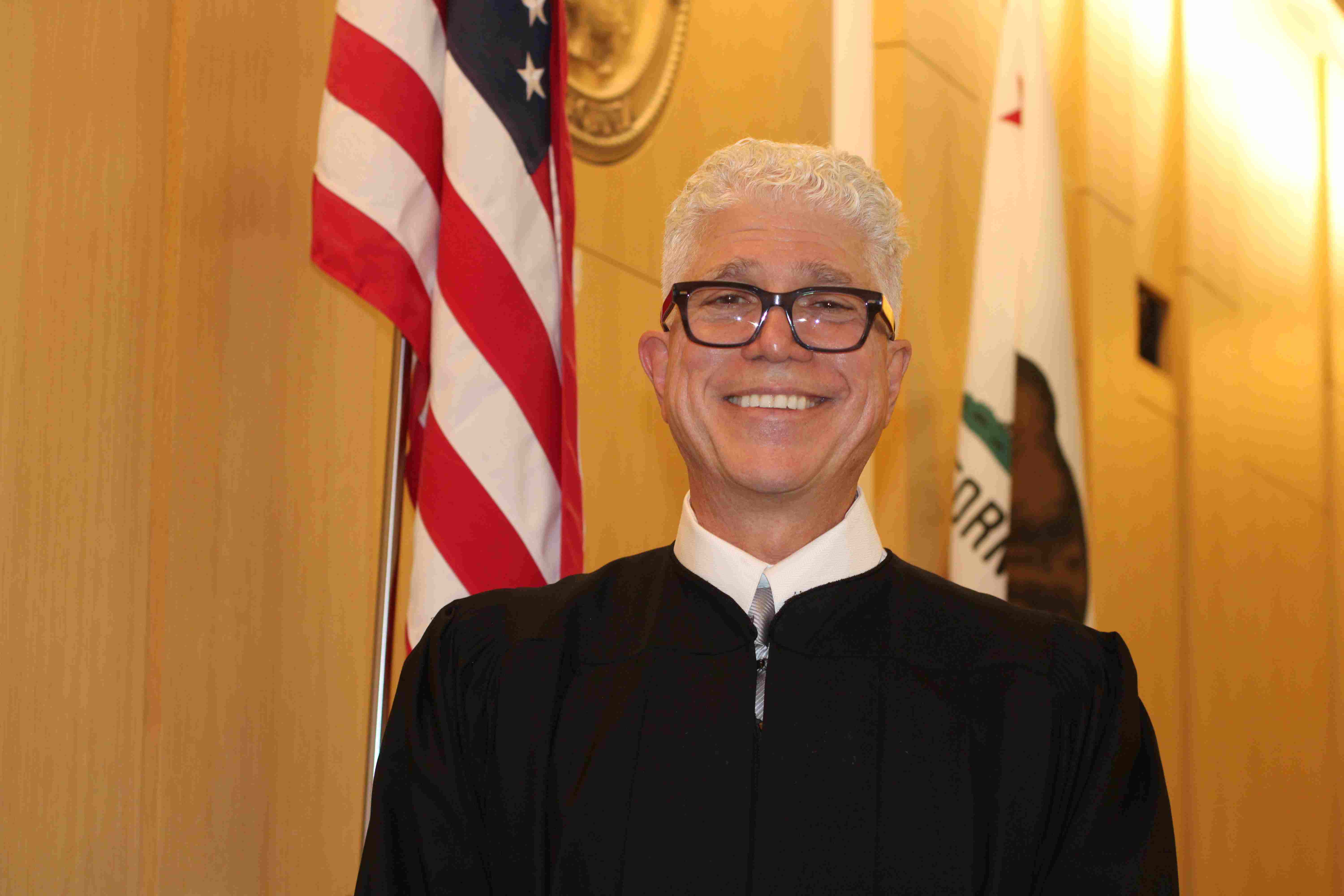 Judge Christopher Frisco carries the weight of a family tradition