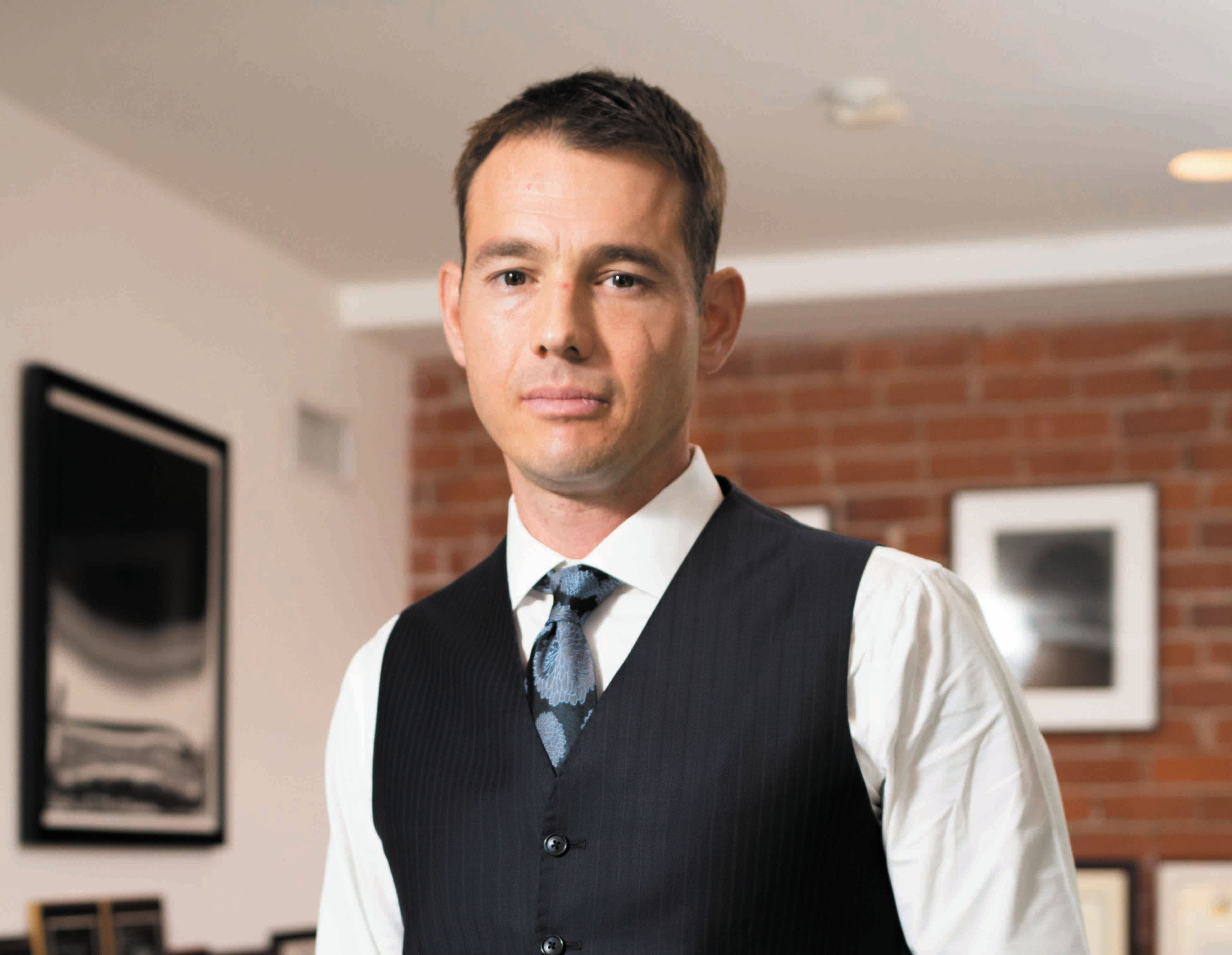 Trial lawyers rally against Uber-backed fee cap initiative.