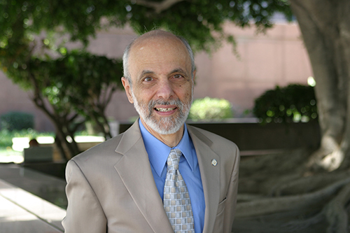 Volunteer mediator Maurice Attie emphasizes professionalism and practical resolution
