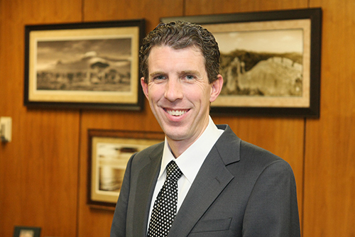 Panel reverses disqualification of county attorney who concealed outside practice