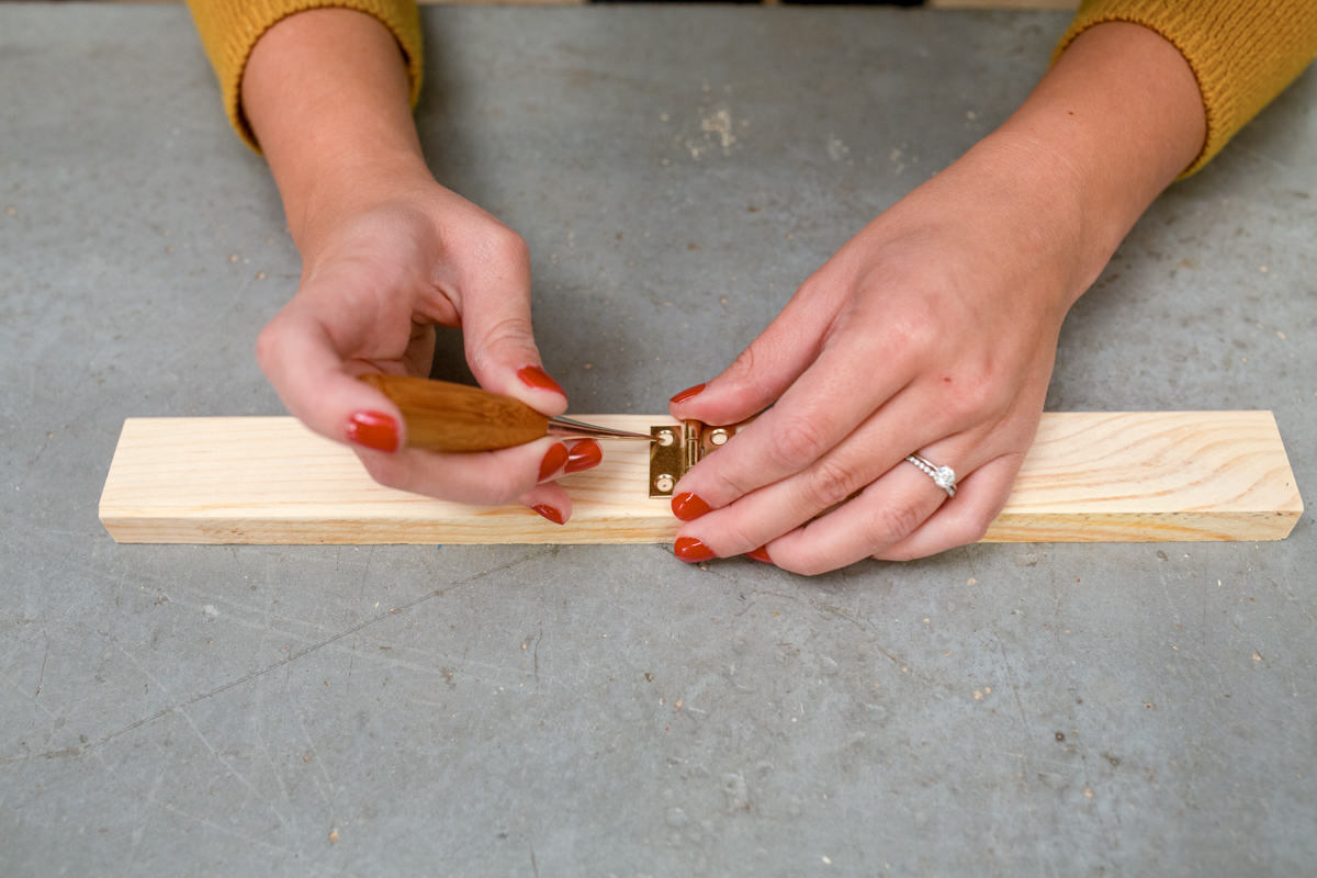 Attach hinges to skirt ends Attach hinges to skirt ends