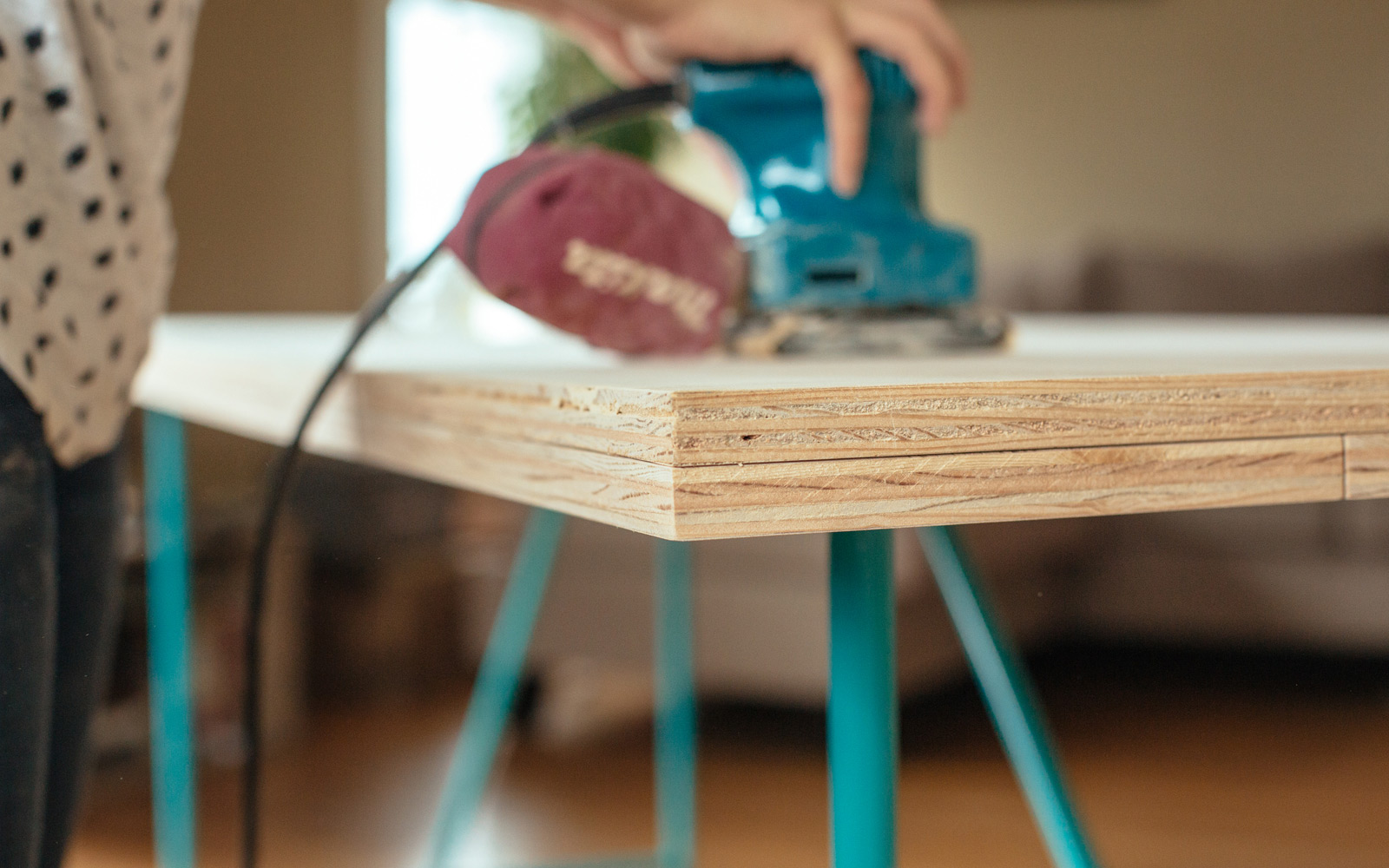 sanding top and sides of tabletop