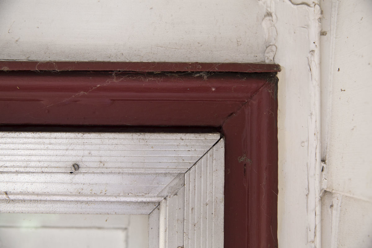 Spider webs on a door frame