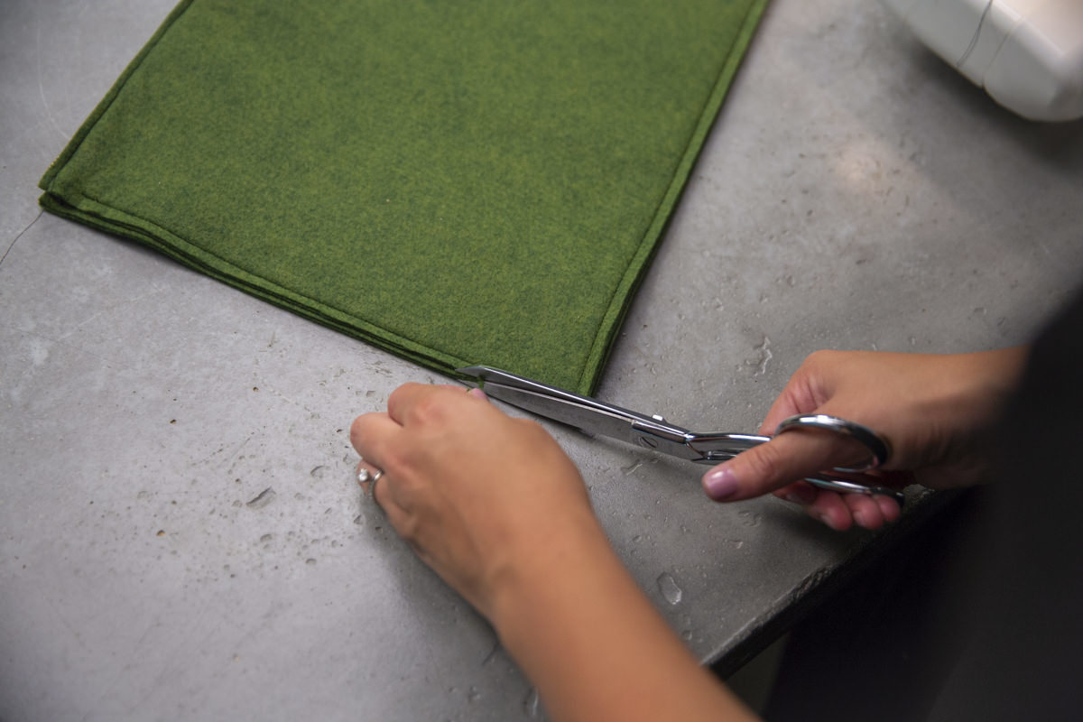 trimming edges of felt case trimming edges of felt case