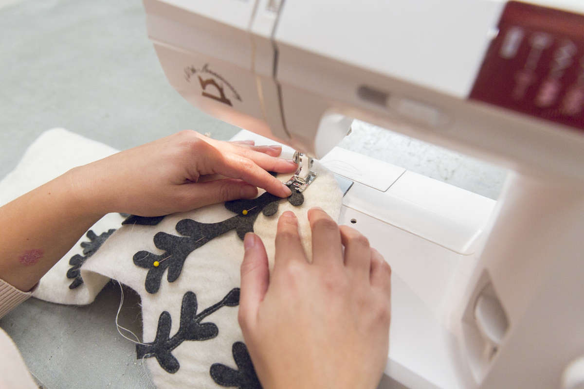 sewing branches on DIY stocking sewing branches on DIY stocking