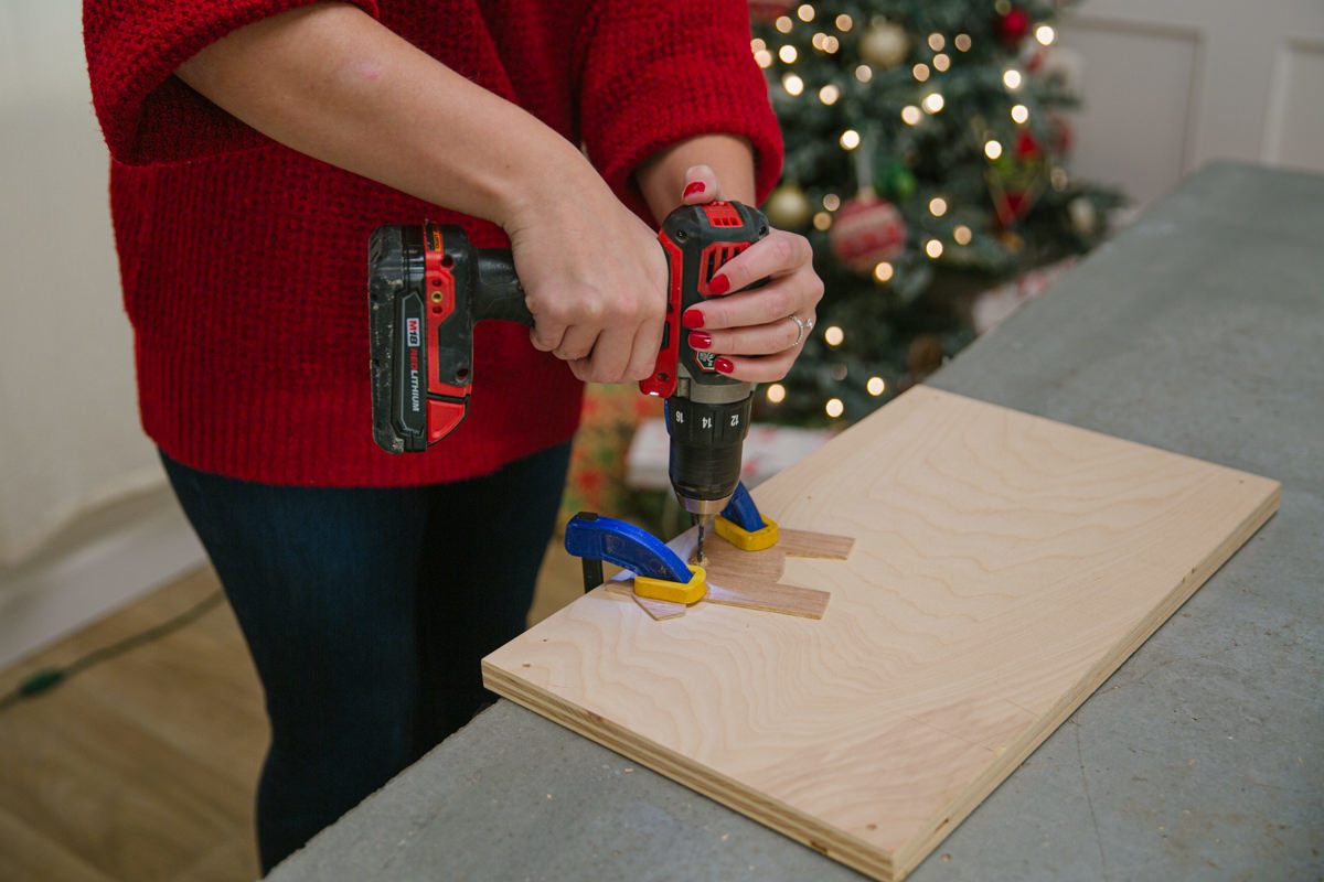 Drill a hole to hang the ornament Drill a hole to hang the ornament