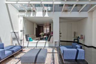 This €1.7M Apartment Comes With a Storefront in the Middle of Paris