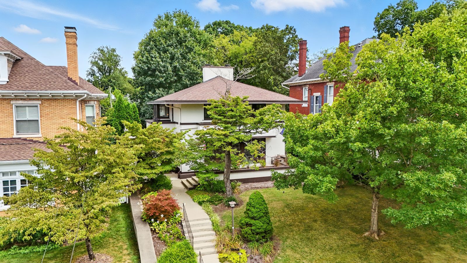 Built in 1910, the Prairie-style Zeigler House is decked out with art glass, built-ins, and a Roman brick fireplace.
