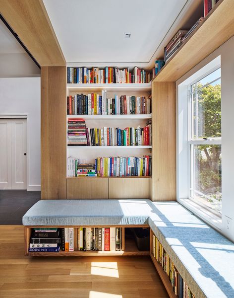 Designer Anne Poon turned an unused window nook into a miniature library for a couple remodeling their San Mateo, California, midcentury.