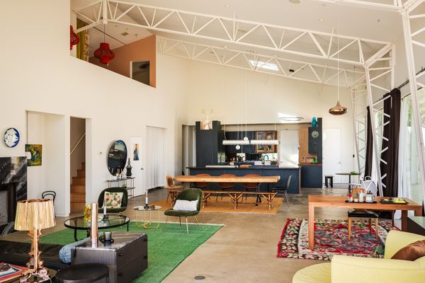 The energy-efficient home takes advantage of passive temperature control, solar panels, and windows coated with a low-emissivity, transparent metallic film.