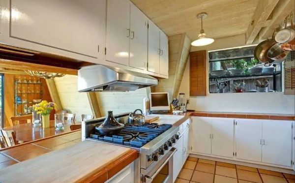 The kitchen was cramped and disconnected from the living space.